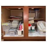 Contents of kitchen cabinet - plastic storage containers, lids and more