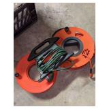 (3) extension cords with 2 cord wheels and cord tote (length is ESTIMATED to be 25, 50ft.)