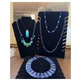 Group of five necklaces. The green and blue on the bottom left is Coldwater Creek