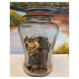 7 1/2 inch vintage jar with vintage buttons enclosed