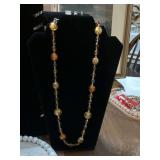 Vintage gold and amber glass beaded necklace. 26” Kay London
