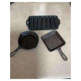 Three miniature cast-iron pieces, two Griswold and one Wagner