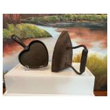 Galerie cast iron heart shaped skillet 5 inches wide and a primitive sad iron.