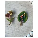 2 vintage enameled brooches from Austria. Floral and a leaf with flowers