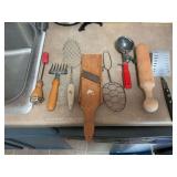Assortment of vintage kitchen utensils