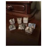 Set of seven miniature house/ buildings. Ceramic
