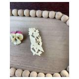 Vintage Celluloid pansy and carved floral/butterfly brooches