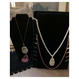 Group of three necklaces as shown. 2 hand carved