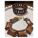 2 wooden beaded bracelets. One stretch