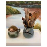 Whimsical pottery face mini vase  and a cup with porcelain pig. Chip on edge of cup.