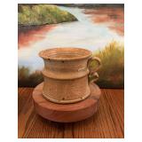 Large 7 1/2“ x 5 1/4 inch pottery piece with ribbon handle