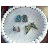 Three pair of Abalone shell geometric earrings. ￼ the triangular ones are vintage Mexico Alpaca.