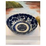 8 1/4” Chinese Flow Blue porcelain bowl with scalloped rim.