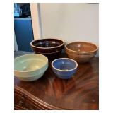 Antique USA set of four glazed stoneware ribbed nesting bowls.  9 “,  8“ , 7” and 5”.