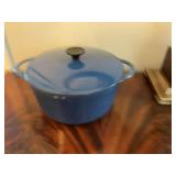 Blue Le Creuset Dutch oven. Enamel over cast iron. Made in France.