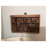 Vintage wooden drawer 10 1/2” x 6 3/4” used as a hanging piece full of printing dies.