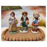 Three vintage porcelain figurines. 2 marked Japan.