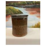 5 inch pottery utensil holder/vase. Signed.