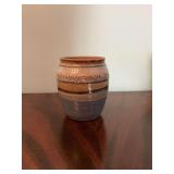 4 1/4 inch pottery vase signed C Smith