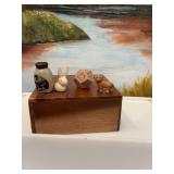 5 1/4 in.² wooden box used as a miniature display shelf with four miniatures.