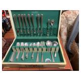 Vintage 55 piece set of Holmes and Edwards, silver plated flatware with silver chest.