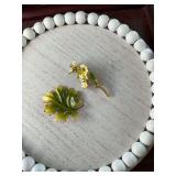 2 vintage enameled brooches. One leaf and one yellow floral.