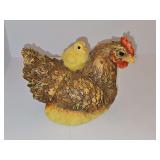 Adorable cast resin hen with baby chick on her back. 7.25 x 4.5 X 6.25 in tall.