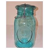 Ball Ideal Bicentennial Celebration Mason Jar issued 1976 in aqua blue glass with a wire bail closure. Great addition for those who collect historical celebratory memorabilia.