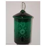 Lovely Etched Green Glass candy jar with lid. 8.5 in tall including lid. One small chip and a few flea bites found as shown in photos.