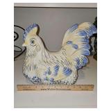 Delft-style blue, whiteand yellow hand-painted ceramic rooster figurine.