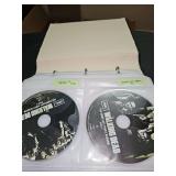 Album of suspense DVDs. Will show several. Includes The walking Dead season 1, The Twilight zone season 1, The Twilight zone volumes 10-27 all inclusive, the outer limits season 2, tails from the cryp