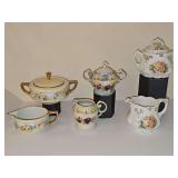 Vintage / antique creamer and covered sugar bowls. Yellow set on far left has sticker residue.