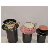 Three cup and saucer sets.