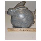 Charming, rotund ceramic rabbit figurine featuring a mottled gray glaze and streamlined, swept-back ears.