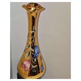 Bohemian/Czech gold-gilt glass vase featuring hand-painted raised enamel floral motifs10.75 in tall. Some gold wear on the bottom of the vases shown.