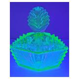 Art Deco uranium glass vanity or dresser box from the 1930s. Lid has a sizable chip as shown. 6.25 X 3.75x 6.5 in tall.