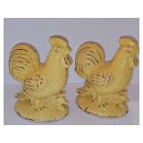 Yellow distressed finish roosters. 7.75 in tall.