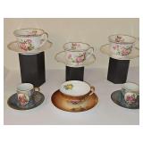 Matching teacups, coffee cups, and demitasse cups and saucers.