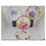 Four beautiful vintage/antique hand-painted shallow bowls/plates with reticulated handles. 10.5 inch diameter