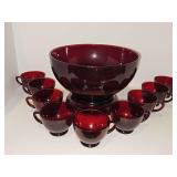 Beautiful ruby red punch bowl with base (10x6.5 in tall) and nine cups.