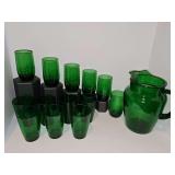Mid Century Anchor Hocking Forest Green glass pitcher with an ice lip and 13 glasses. 6 marching and 7 matching. See all photos.