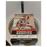 New in packaging Bobby Flay professional grade nonstick 4.5 quart saute pan with lid.