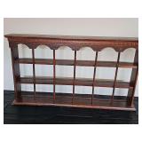 Wall hanging display rack with plate ledge. 36x5x20-in tall.