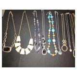 Nice grouping of shorter costume jewelry necklaces.