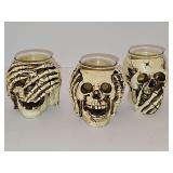 See no evil, hear no evil, speak no evil, skull candle holders. Super cute for halloween. 3.75 in tall