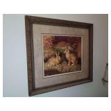 Classic wildlife print titled "Rabbits In Autumn" by the artist Henry Carter, ornate, distressed gold-finish wooden frame with classic carved acanthus leaf scrollwork and a wide, textured neutral mat.