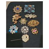 Brooches for repair or repurpose.