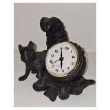 Squirrel with acorn clock. Keeping time when listed.