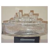 "Remember the Maine" clear glass battleship candy dish or trinket box. 7.25 in Long X 3.75 in tall including lid. These commemorative glass dishes were produced around the turn of the 20th century to 