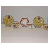 Three demitasse cups and saucers. Easels NOT included.